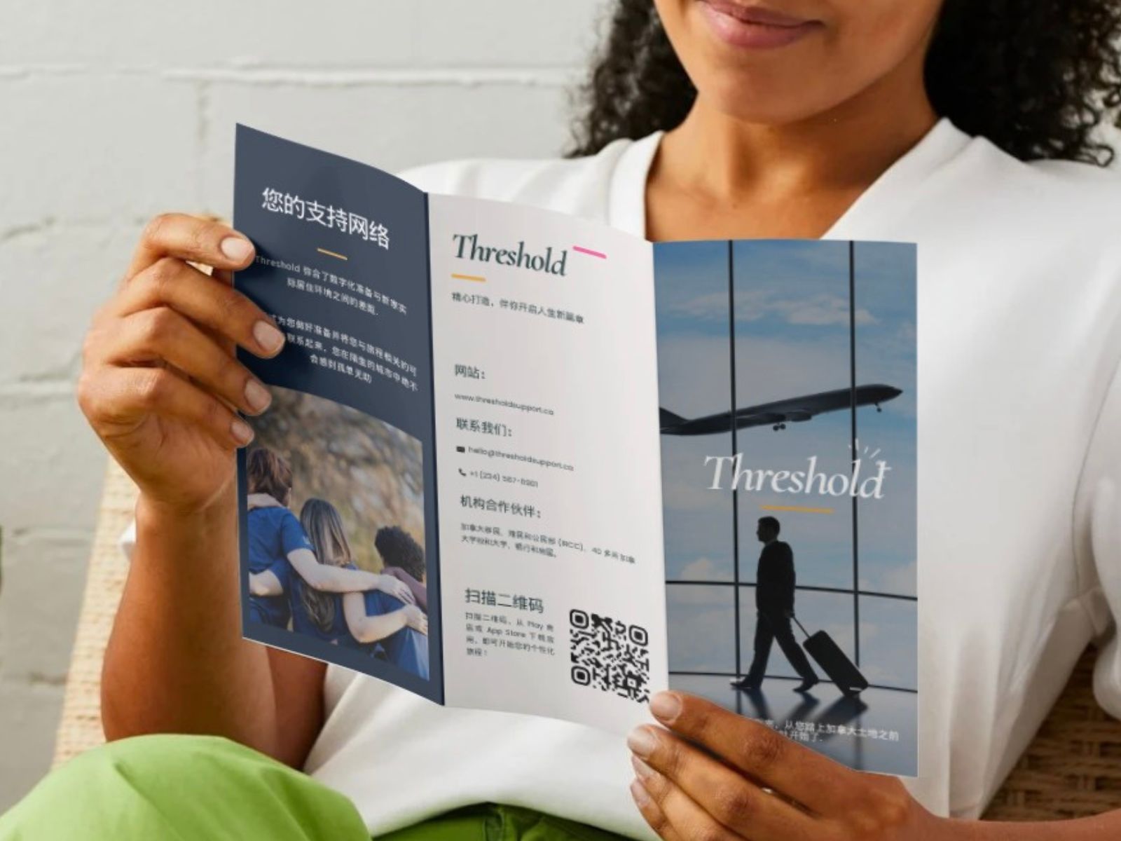 Threshold pre-arrival brochure shown open and folded